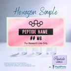 A digital mockup showing a customizable peptide label template with a pink watercolor background, black text placeholders, and three small vials below. The image includes branding for 'PeptiPrints' and the product name 'Hexagon Simple'.